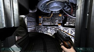 Screenshot of a corridor in Doom 3 running in widescreen.